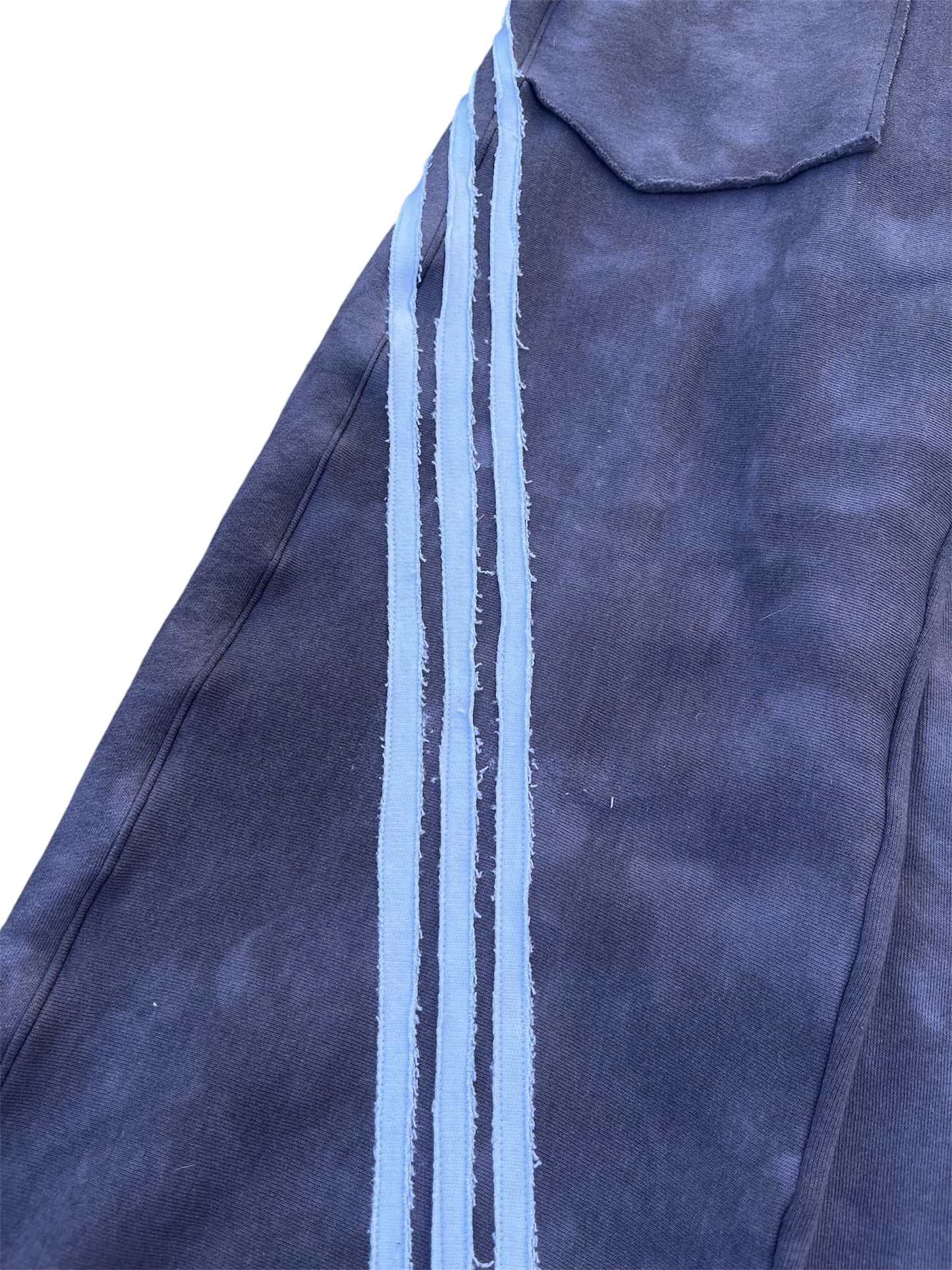 WARPED TRIPLE STRIPE SWEATPANTS